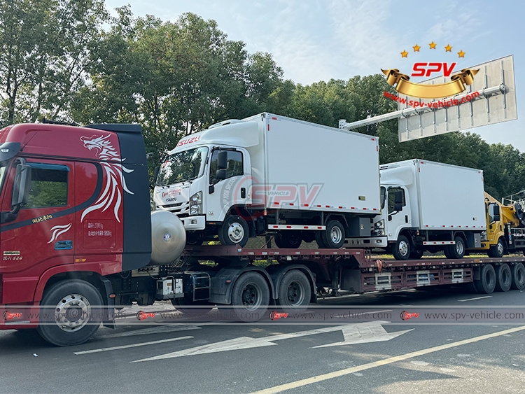 2 Units of 4 Tons Reefer Trucks ISUZU Loaded Onto Flatbed Truck